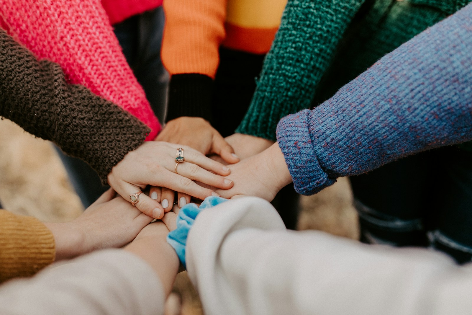 Hands joined together representing people mobilized around a shared mission